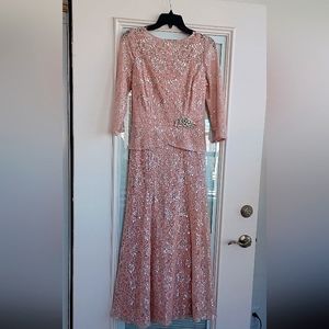 Mother of the pride or for any occasion. Beautiful pink with silver dress